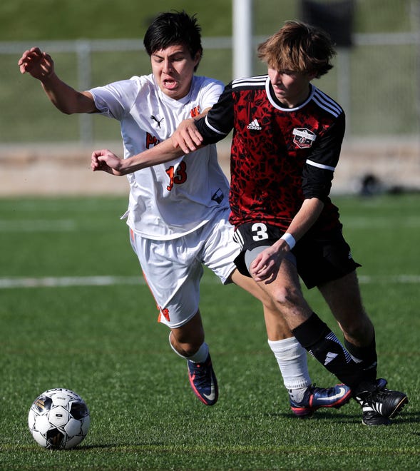 West De Pere High School's Johan Hernandez (13) defends against Union Grove High School's Ryan Lee (3) during their WIAA Division 2 boys soccer championship game Saturday, November 4, 2023, at Uihlein Soccer Park in Milwaukee, Wis.