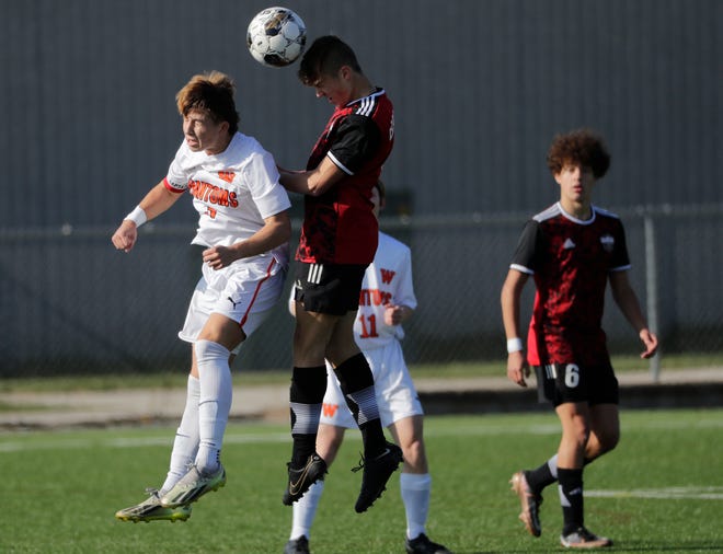 West De Pere High School's Tyler Kowalczyk (3) goes up for a header against Union Grove High School's Niall Hagen (9) during their WIAA Division 2 boys soccer championship game Saturday, November 4, 2023, at Uihlein Soccer Park in Milwaukee, Wis.