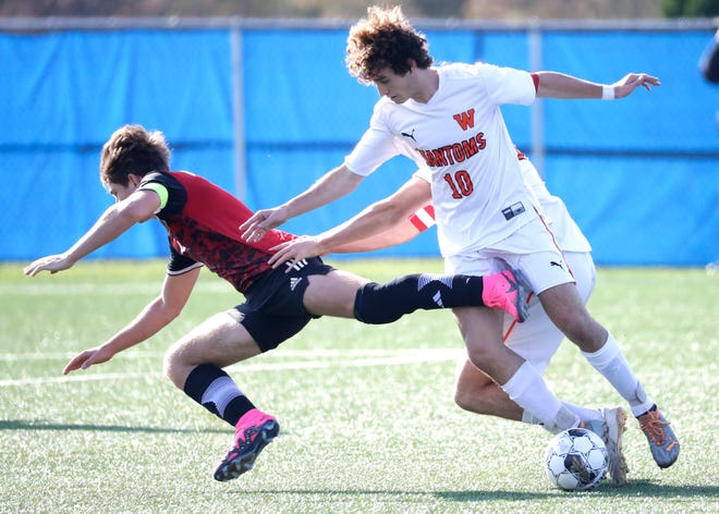 West De Pere High School's Carter Borley (10) fouls Union Grove High School's Owen Zikowski (7) during their WIAA Division 2 boys soccer championship game Saturday, November 4, 2023, at Uihlein Soccer Park in Milwaukee, Wis.