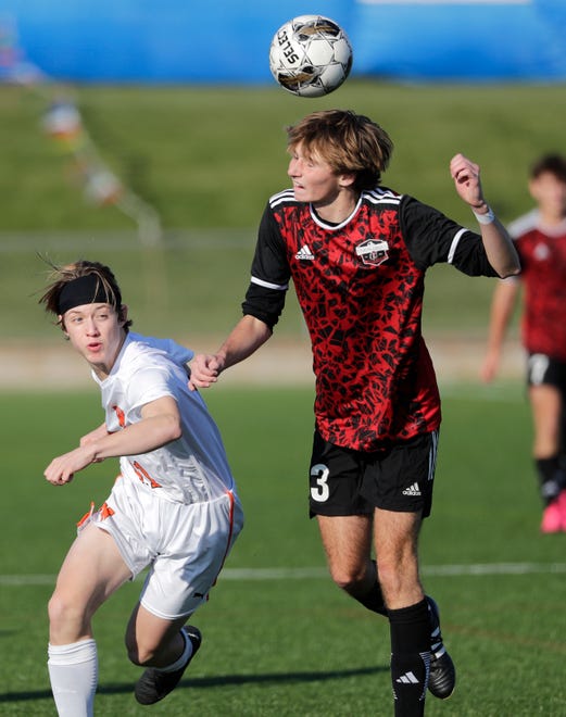 Union Grove High School's Ryan Lee (3) heads the ball against West De Pere High School's Kaveh Garania (11) during their WIAA Division 2 boys soccer championship game Saturday, November 4, 2023, at Uihlein Soccer Park in Milwaukee, Wis.