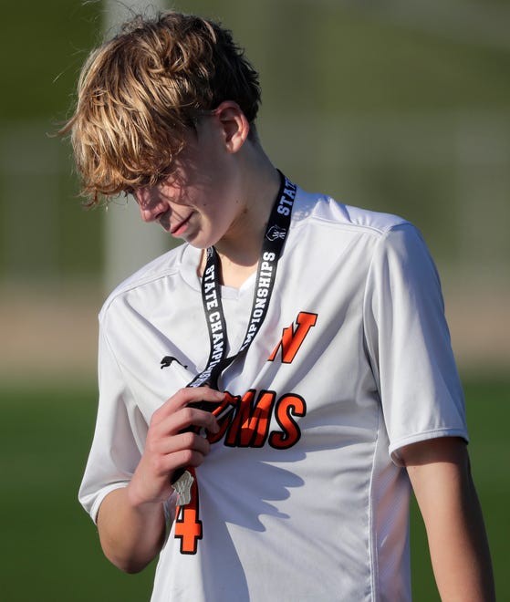 West De Pere High School's Grayson Birder (4) walks away after receiving his runners-up medal in a 1-0 loss against Union Grove High School during their WIAA Division 2 boys soccer championship game Saturday, November 4, 2023, at Uihlein Soccer Park in Milwaukee, Wis.